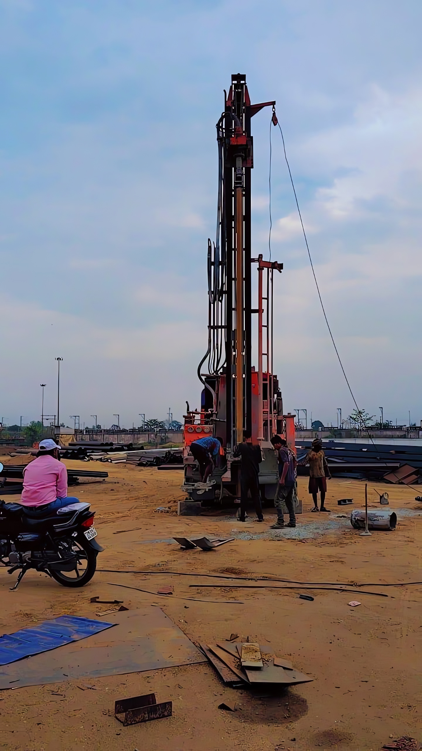 Hitech rotary rig and crew at an industrial project site